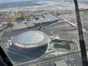 Aerial view of Allegiant Stadium shot from an Airsign plane