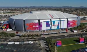 Aerial image of State Farm Stadium in Las Vegas, decorated with branding for Super Bowl LVII in 2023.