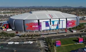Aerial image of State Farm Stadium in Las Vegas, decorated with branding for Super Bowl LVII in 2023.
